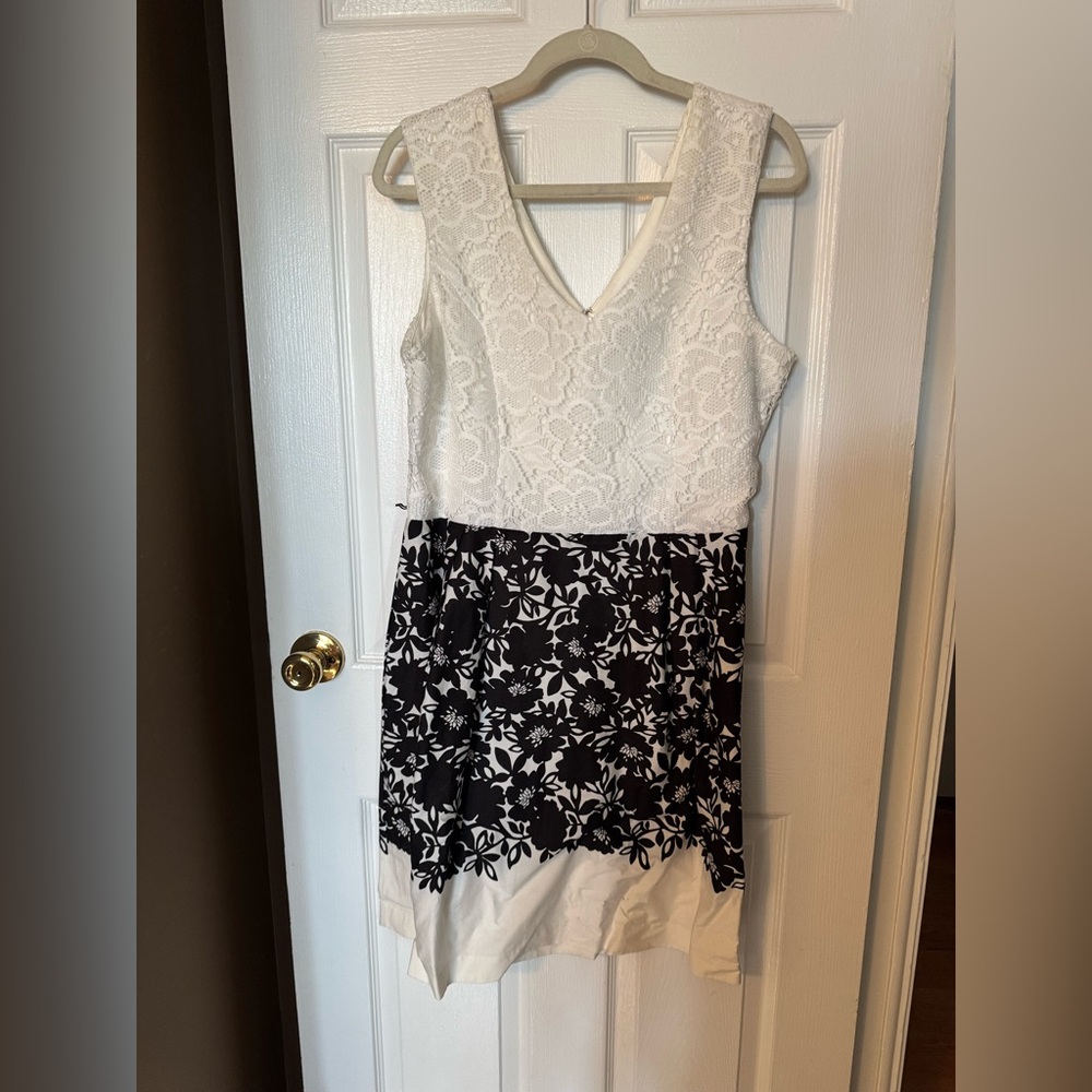 White lace dress with black floral skirt